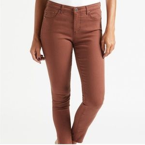 AG Super Skinny Legging Ankle Jeans in rust/terracotta red color. Size 24.